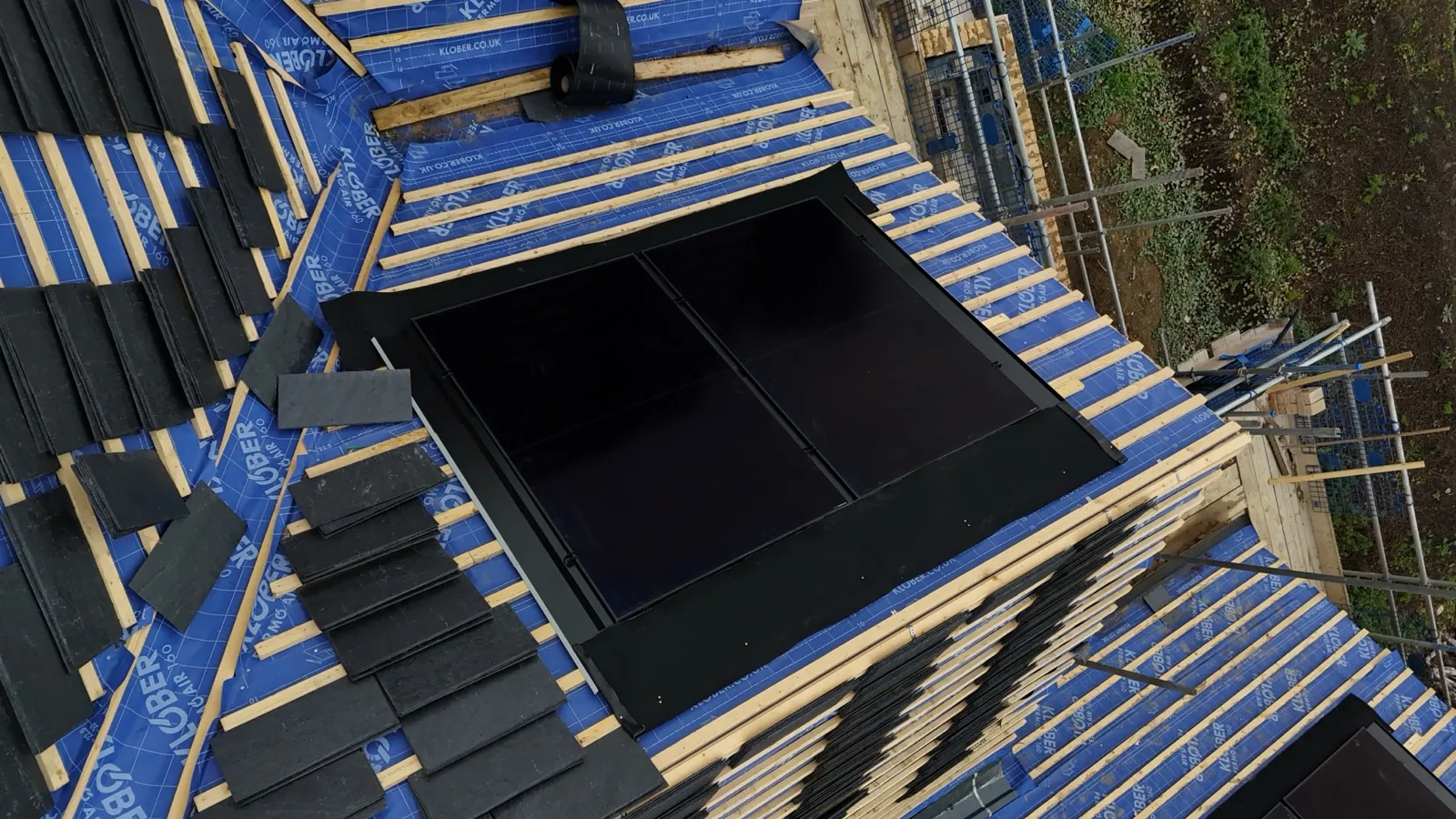 250kW solar array on a Bedford distribution warehouse roof, aerial drone view