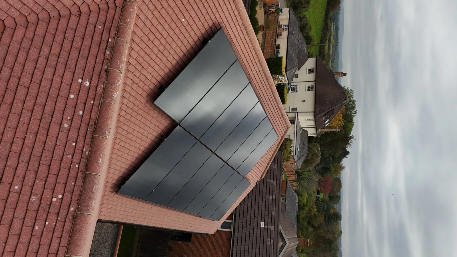 Hotel rooftop solar with 100kWh battery storage, aerial view in Hertfordshire